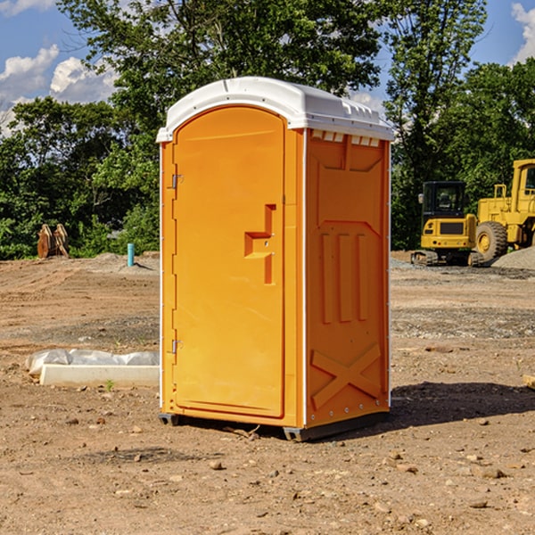 what is the cost difference between standard and deluxe portable restroom rentals in Guilford Maine